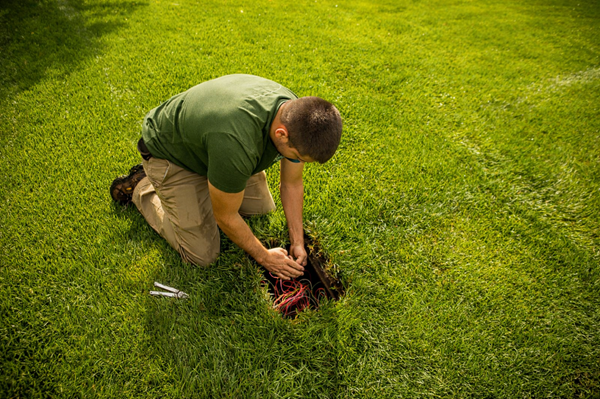 repairing a sprinkler in utah county